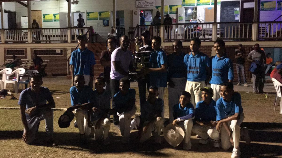TSC receiving the winner’s trophy from former West Indies Test player Travis Dowlin.
