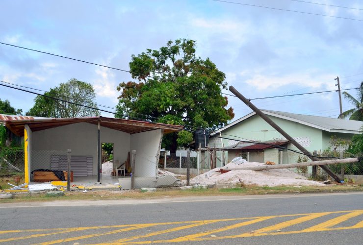 The shop and the two utility posts that were damaged in the crash. 