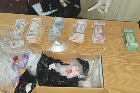 A quantity of local and foreign currency was among the items discovered. 