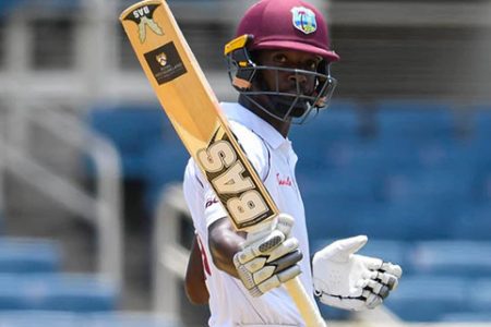 Shamarh Brooks salutes after reaching his maiden Test century. (CWI photo)