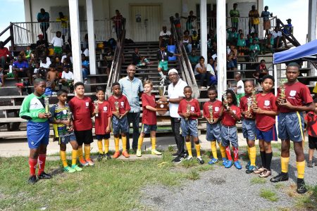 The victorious VMFA squad posing with their spoils after winning the EBFA/Ralph Green Under-11 Football championship at the National Training Centre, Providence.
