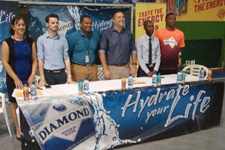 Members of the launch party for the 15th edition of the Diamond Mineral Water Indoor Hockey Festival from left to right-GHB Secretary Trisha Fiedtkou, Nicholas Yearwood, Communications Manager of ExxonMobil, Treiston Joseph, Communications Director of Ansa McAl, GHB President Phillip Fernandes, Larry Wills, Diamond Mineral Water Brand Manager and GHB Executive Devin Hooper