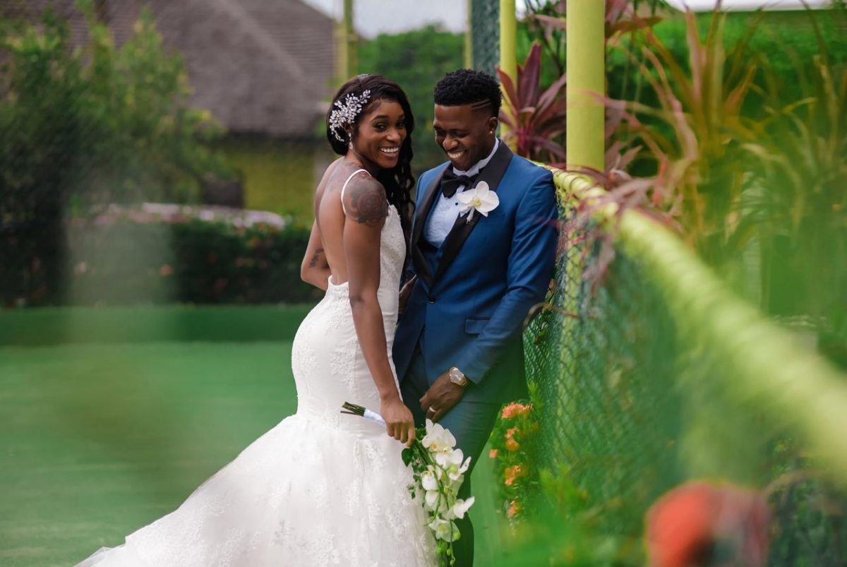 Jamaica’s double Olympic champion Elaine Thompson poses with her husband Derron Herah during their wedding ceremony at Old Fort Bay in St Ann on Saturday. (Photo: LEXON)