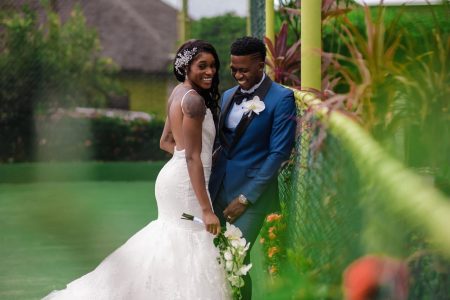 Jamaica's double Olympic champion Elaine Thompson poses with her husband Derron Herah during their wedding ceremony at Old Fort Bay in St Ann on Saturday. (Photo: LEXON)