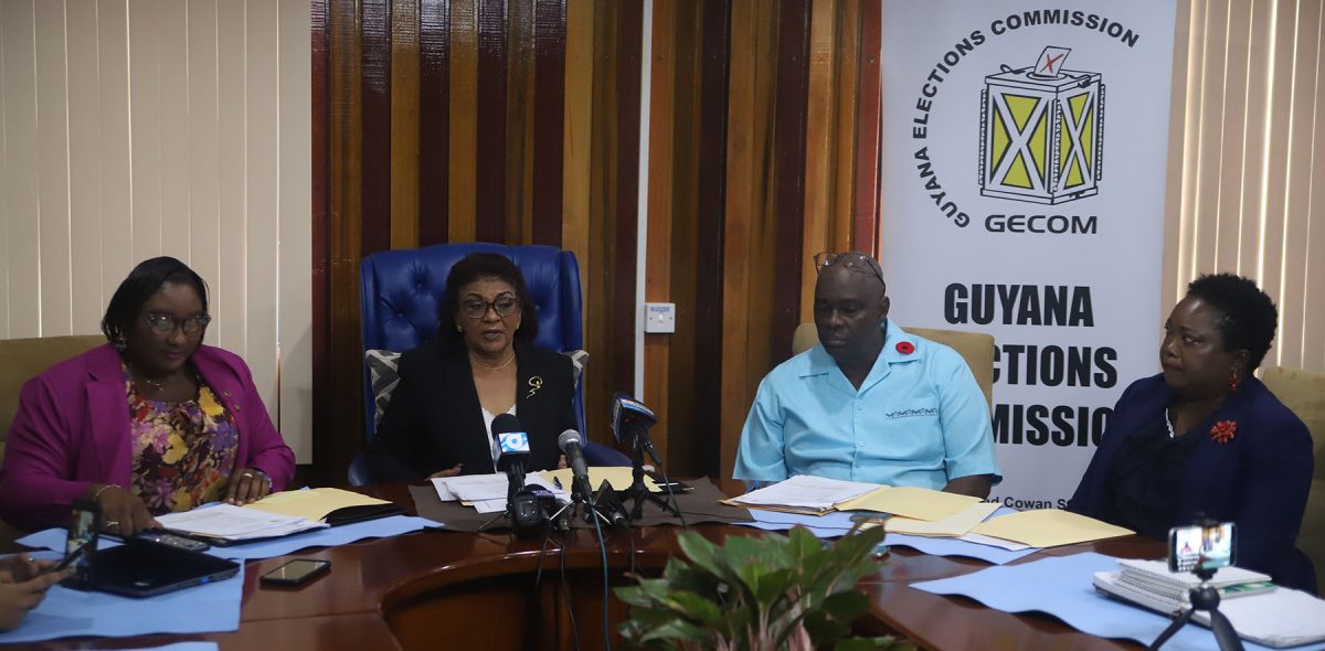 GECOM Chair Justice (ret’d) Claudette Singh addressing reporters at her first press conference yesterday, while being flanked by GECOM public relations officer Yolanda Ward (at left), Chief Election Officer Keith Lowenfield and Deputy Chief Election Officer Roxanne Myers. (Terrence Thompson photo) 