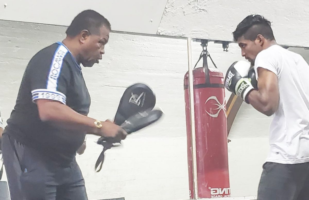 Elton Dharry going through some final preparations ahead of his interim World Boxing Association (WBA) Super Flyweight title fight versus Australian Andrew ‘The Monster’ Moloney. He is trained by former standout boxer, Lennox Blackmoore.
