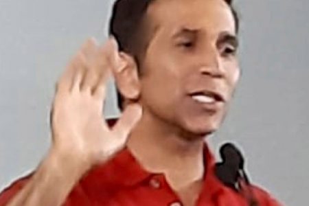 Attorney General Faris Al-Rawi address suppporters during the PNM’s public meeting at the CAL Skiffle Steel Orchestra panyard in San Fernando earlier this week.