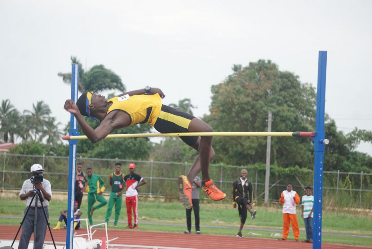 Jennis Benjamin of Linden Technical Institute  raised the bar yesterday in the Boys U/20 High Jump. He smashed the old record of 1.79 set by Okemi Porter last year with a best jump of 1.95 metres.