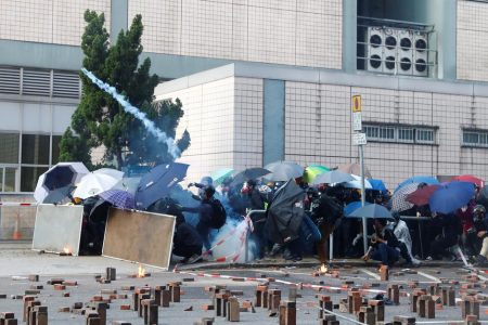 Protesters clash with riot police as they try to leave the surrounded campus of Hong Kong Polytechnic University (PolyU), in Hong Kong, China November 18, 2019. REUTERS/Thomas Peter