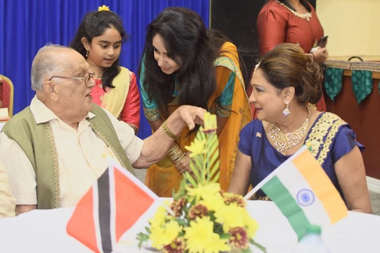 Sanatan Dharma Maha Saba (SDMS), Sat Maharaj and Opposition Leader Kamla Persad-Bissessar chat with Vrishni S Maharaj and Vasudha S Maharaj