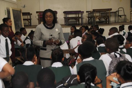 Minister of Education Dr Nicolette Henry meeting with students of Richard Ishmael Secondary yesterday in the wake of violence at the school. (Ministry of Education photo)