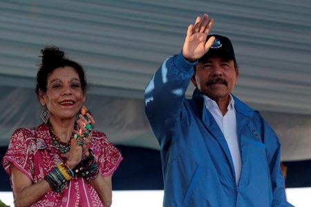 Nicaragua’s President Daniel Ortega and Vice President Rosario Murillo greet supporters during an event to commemorate the 40th anniversary of the taking of the national palace by Sandinistas guerrilla in 1978, in Managua, Nicaragua August 22, 2018. Picture taken August 22,2018. REUTERS/Oswaldo Rivas