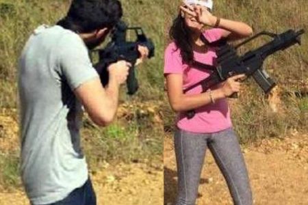 Attorney General Faris Al-Rawi's children “with guns” at Camp Cumuto on November 2015.