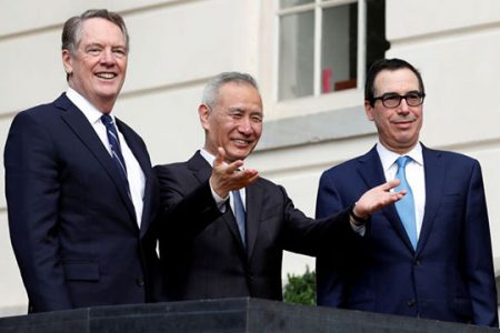 China’s Vice-Premier Liu He gestures to the media between US Trade Representative Robert Lighthizer (left) and Treasury Secretary Steve Mnuchin before the two countries’ trade negotiations in Washington, Oct 10, 2019.PHOTO: REUTERS