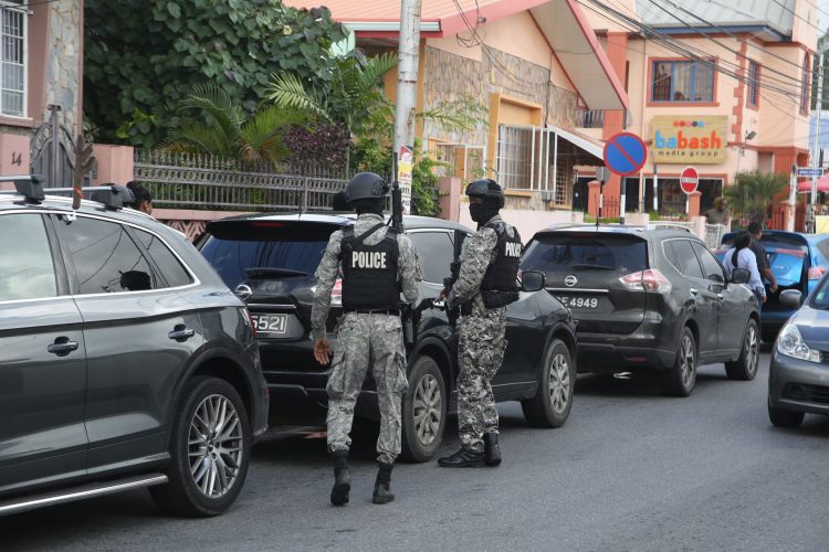 SORT at the scene on Delhi Street, in St James yesterday.