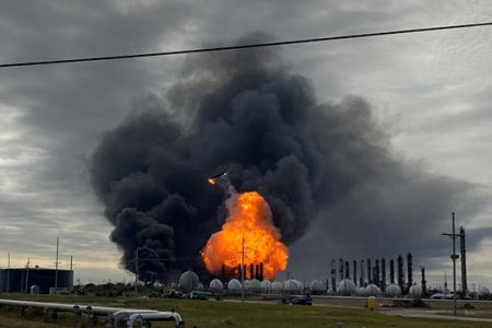 Flames are seen after a massive explosion that sparked a blaze at a Texas petrochemical plant in Port Neches, Texas, U.S., November 27, 2019.  REUTERS/Erwin Seba
