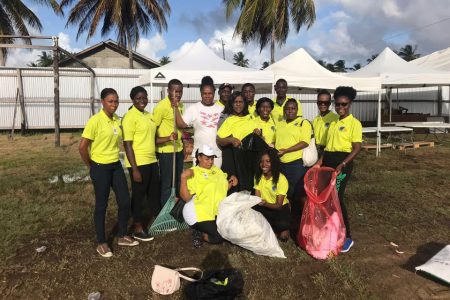 The Victoria Adventist Youth Leadership Award Club cleaned up the Victoria Ground for the village’s massive 180th  anniversary celebration. It is part of the club’s initiative to give back to the community.
In photo, members of the club and Minister of Foreign Affairs Dr Karen Cummings.
