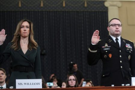 Jennifer Williams, a special adviser to Vice President Mike Pence for European and Russian affairs and Alexander Vindman, director for European Affairs at the National Security Council, are sworn in to testify before a House Intelligence Committee hearing as part of the impeachment inquiry into U.S. President Donald Trump on Capitol Hill in Washington, U.S., November 19, 2019. REUTERS/Jonathan Ernst