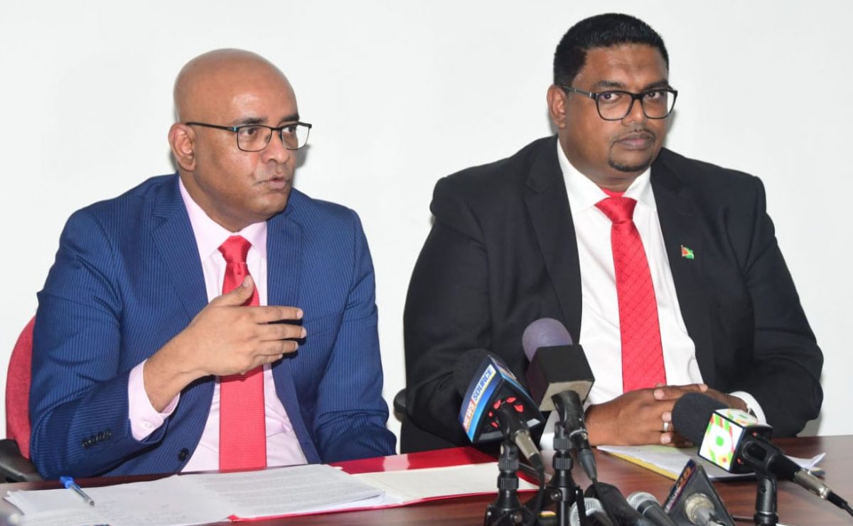 Presidential candidate Irfaan Ali (right) and Opposition Leader Bharrat Jagdeo at the press conference yesterday.