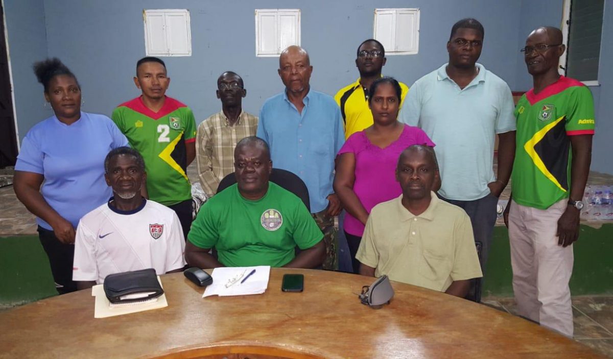EBFA President Kevin Anthony (seated centre) flanked by VPs Orien Angoy (left) and Clayton Lambert Snr.
At back from left, Amanda Angoy, Devnon Winter, Wayne Francois, Noel Harry, Dillion Roberts, Troy Jeffers and GFF’s Lyndon France.
