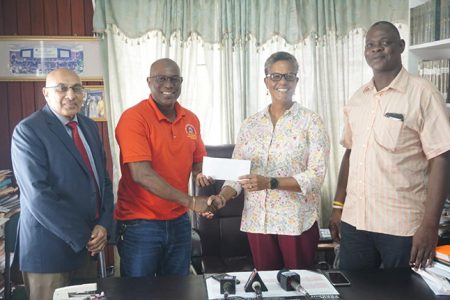 Vice President of the Association, Dr. Karen Pilgrim unwrapped a gift for the GBA to the tune of US$15,000 yesterday to significantly assist with the three-month stint on the local contingent in Cuba .  