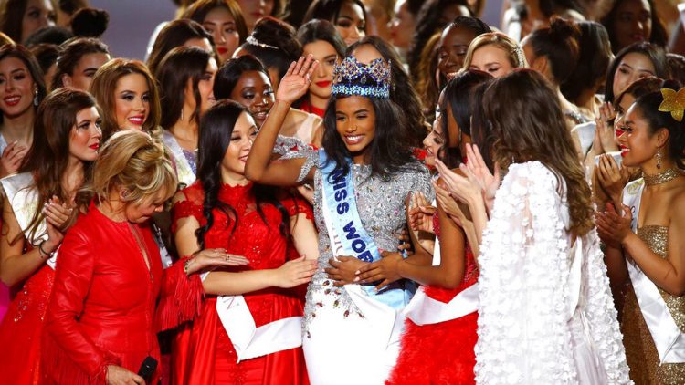 Miss World 2019 Toni-Ann Singh of Jamaica is congratulated by other contestants after winning the award during the 69th annual Miss World competition at the Excel centre in London, England