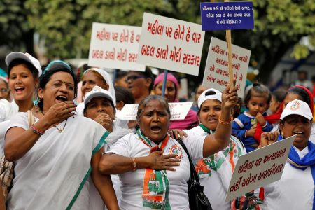 Supporters of India's main opposition Congress party shout slogans during a protest against the alleged rape and murder of a 27-year-old woman, in Ahmedabad, India, December 5, 2019. REUTERS/Amit Dave