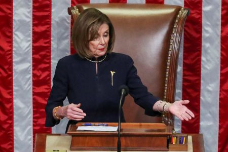 U.S. Speaker of the House Nancy Pelosi (D-CA) wields the gavel as she presides over the House of Representatives approving two counts of impeachment against U.S. President Donald Trump in the House Chamber of the U.S. Capitol in Washington, U.S., December 18, 2019. REUTERS/Jonathan Ernst
