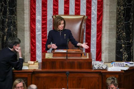 U.S. Speaker of the House Nancy Pelosi (D-CA) presides over the House of Representatives vote on one of two articles of impeachment against U.S. President Donald Trump, accusing the president of abusing his power and obstructing Congress, inside the House Chamber of the U.S. Capitol in Washington, U.S., December 18, 2019. REUTERS/Jonathan Ernst