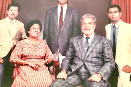 A family portrait of Fazeel Rayman and his wife, Philomena (seated) with their three sons.