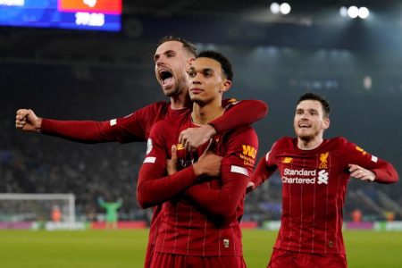 Trent Alexander-Arnold celebrates scoring their fourth goal with Jordan Henderson and Andrew Robertson REUTERS/Andrew Yates