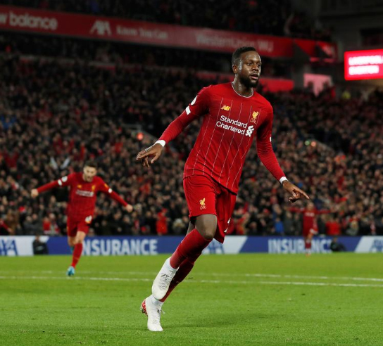 Liverpool’s Divock Origi celebrates scoring their third goal Action Images via Reuters/Lee Smith.
