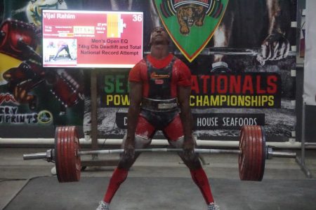 Vijai Rahim dead lifted a mammoth 700 pounds yesterday at the St. Stanislaus College to highlight this year’s Senior National Powerlifting Championships. (Emmerson Campbell photo)
