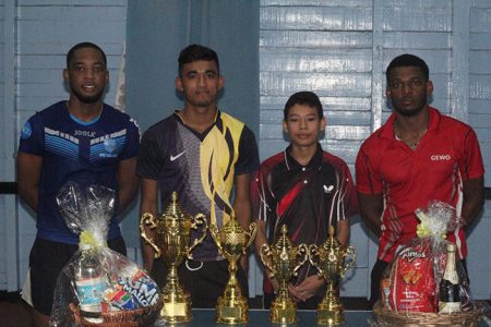 Shemar Britton and his youth partner Yeudistir Persaud and second-place finishers Colin Wong and Joel Alleyne. 
