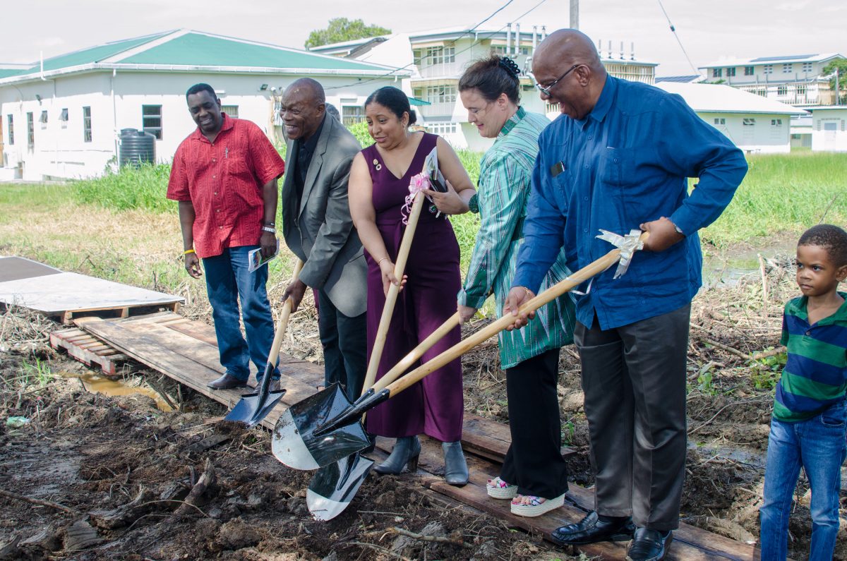 From right are Finance Minister Winston Jordan, Professor Paloma Mohamed Martin, UNICEF Country Representative Sylvie Fouet and Dean Al Creighton. (Department of Public Information photo)