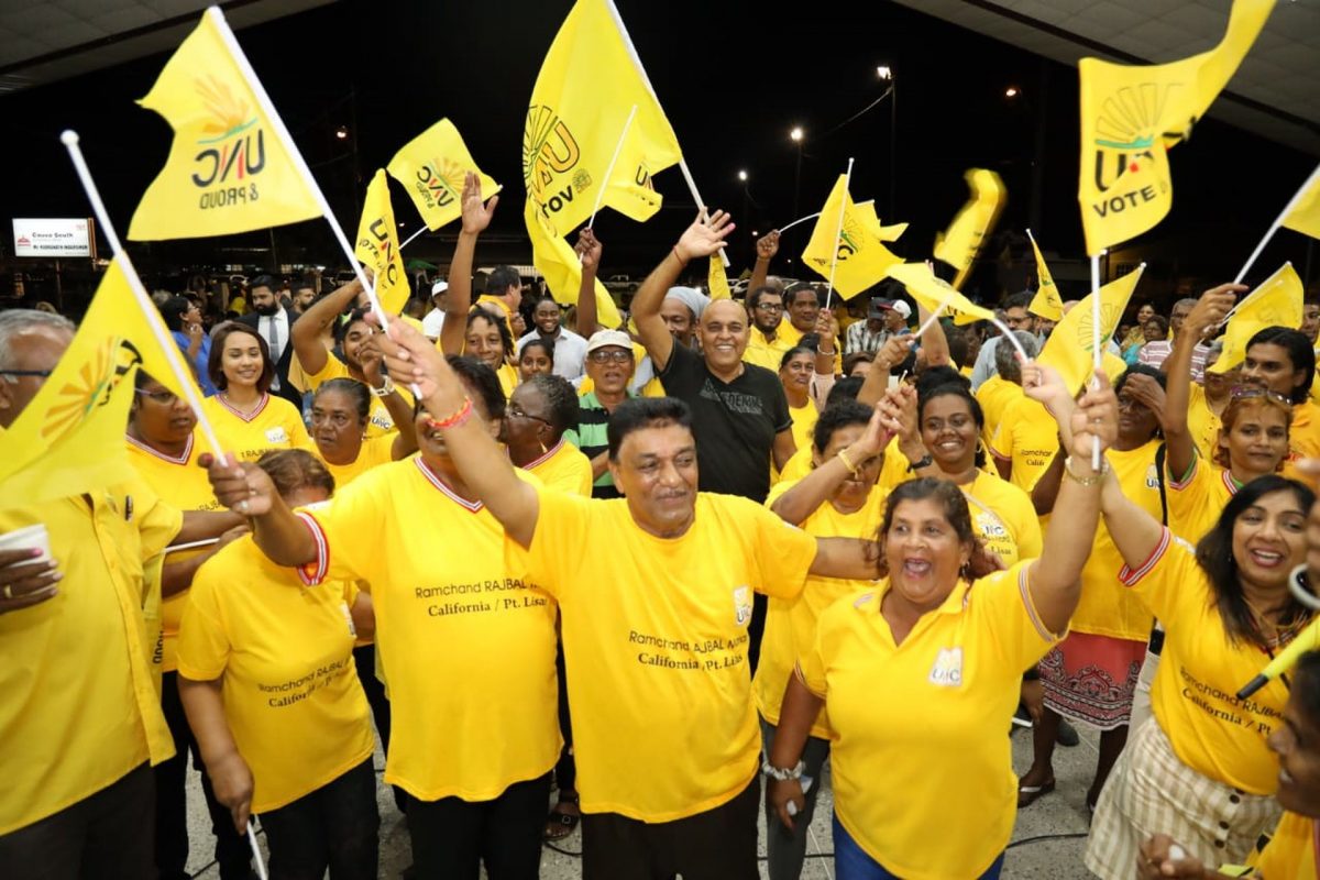 UNC supporters celebrate Local Government Election results at the UNC’s Multipurpose Hall in Couva, Monday night.