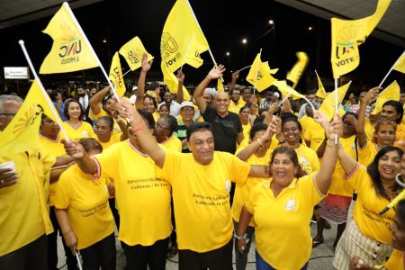 UNC supporters celebrate Local Government Election results at the UNC’s Multipurpose Hall in Couva, Monday night.