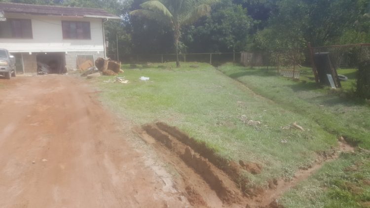 Residue from the spill was still visible in several residents’ yards and a nearby playground even after clean-up efforts on Thursday
