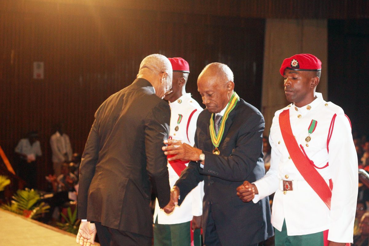 President David Granger [left) in 2015 congratulating Bryn Pollard SC on his national award of the Order of Roraima for his “contributions in the field of law at the National, Regional, Commonwealth and International levels.”