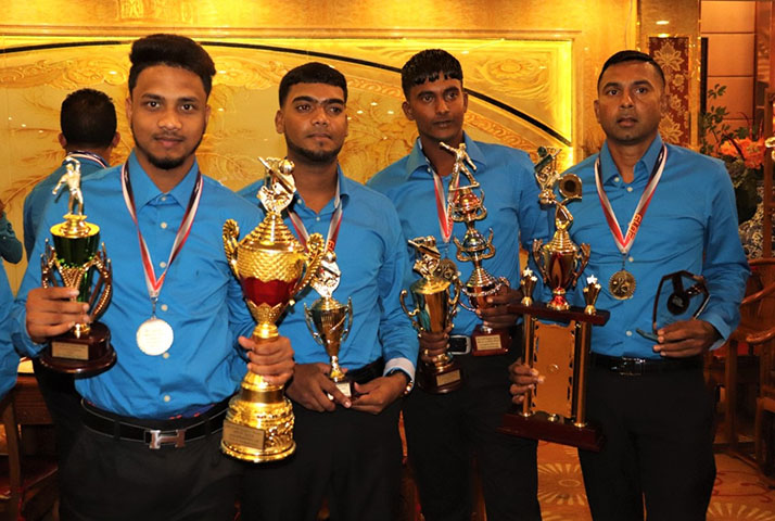 The dynamic quartet: From left, Most Valuable Player Keshram Seyhodan, Most Improved Player Ganesh Puran, All-rounder of the Year Daniel Basdeo and Cricketer of the Year Sudesh Persaud. (Romario Samaroo photo)