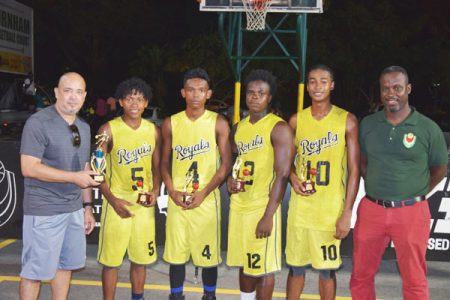 Flashback-The victorious Victory Valley Royals Kobe Tappin [2nd left], Delroy Belle [3rd left], Shemroy Green [4th left] and Immanuel LaRose [5th left] posing for the cameras after winning the GABF 3x3 Championship. Also in the photo is GABF President Michael Singh [left] and GABF 3x3 Coordinator Junior Hercules [right]
