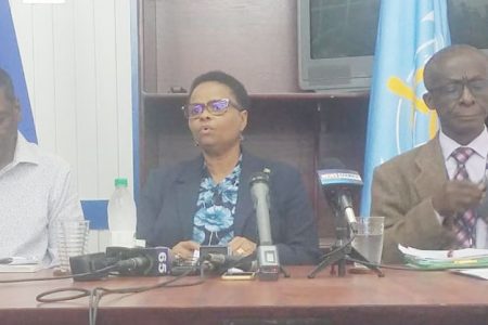 Minister of Public Health Volda Lawrence (centre) with Dr. William Adu-Krow, PAHO/WHO Country Representative (at right) and Chief Medical Officer Dr Shamdeo Persaud at the press conference yesterday.