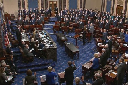 Chief Justice of the United States John Roberts swears in senators during the procedural start of the Senate impeachment trial of U.S. President Donald Trump in this frame grab from video shot in the Senate Chamber at the U.S. Capitol in Washington, U.S., January 16, 2020. REUTERS/U.S. Senate TV/Handout via Reuters
