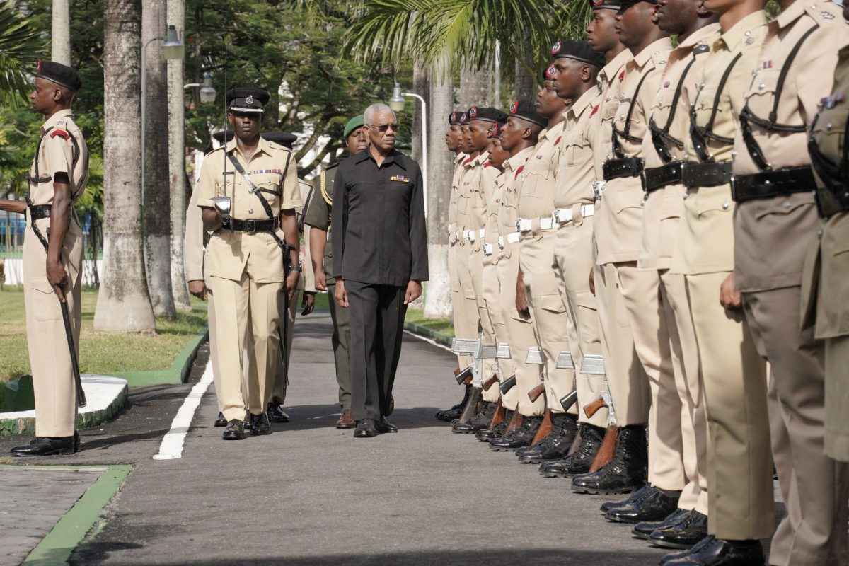 President David Granger inspecting the guard of honour this morning. [Ministry of the Presidency photo)