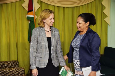 Minister of State,  Dawn Hastings-Williams (right) with United States Ambassador to Guyana,  Sarah-Ann Lynch yesterday. (Ministry of the Presidency photo)
