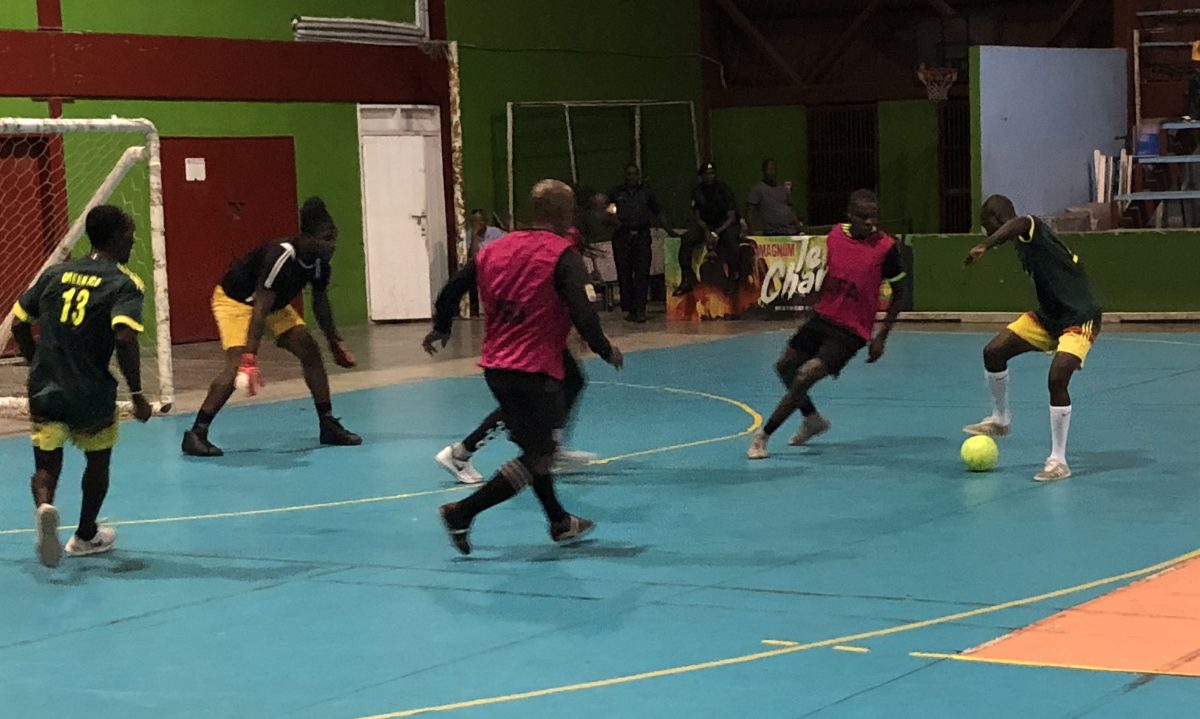 Scenes from the Mocha (red) and Alexander Village clash in the Magnum Tonic Wine Mashramani Cup Futsal Championship at the National Gymnasium, Mandela Avenue
