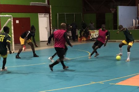 Scenes from the Mocha (red) and Alexander Village clash in the Magnum Tonic Wine Mashramani Cup Futsal Championship at the National Gymnasium, Mandela Avenue
