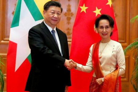 Myanmar State Counselor Aung San Suu Kyi shakes hands with Chinese President Xi Jinping at the Presidential Palace in Naypyitaw, Myanmar, January 18, 2020. Nyein Chan Naing/Pool via REUTERS