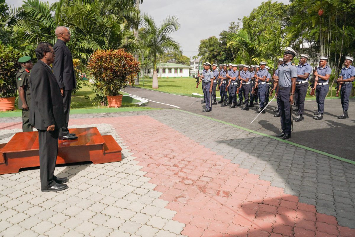 President David Granger takes the Presidential salute from members of the Coast Guard at the opening of the Annual Officers’ Conference of the Guyana Defence Force yesterday morning. [Ministry of the Presidency photo)