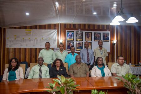 Returning Officers with Chief Election Officer, Keith Lowenfield (seated fourth from left) and (Rtd) Justice Claudette Singh, Chairperson, GECOM (seated third from left). (DPI photo)
